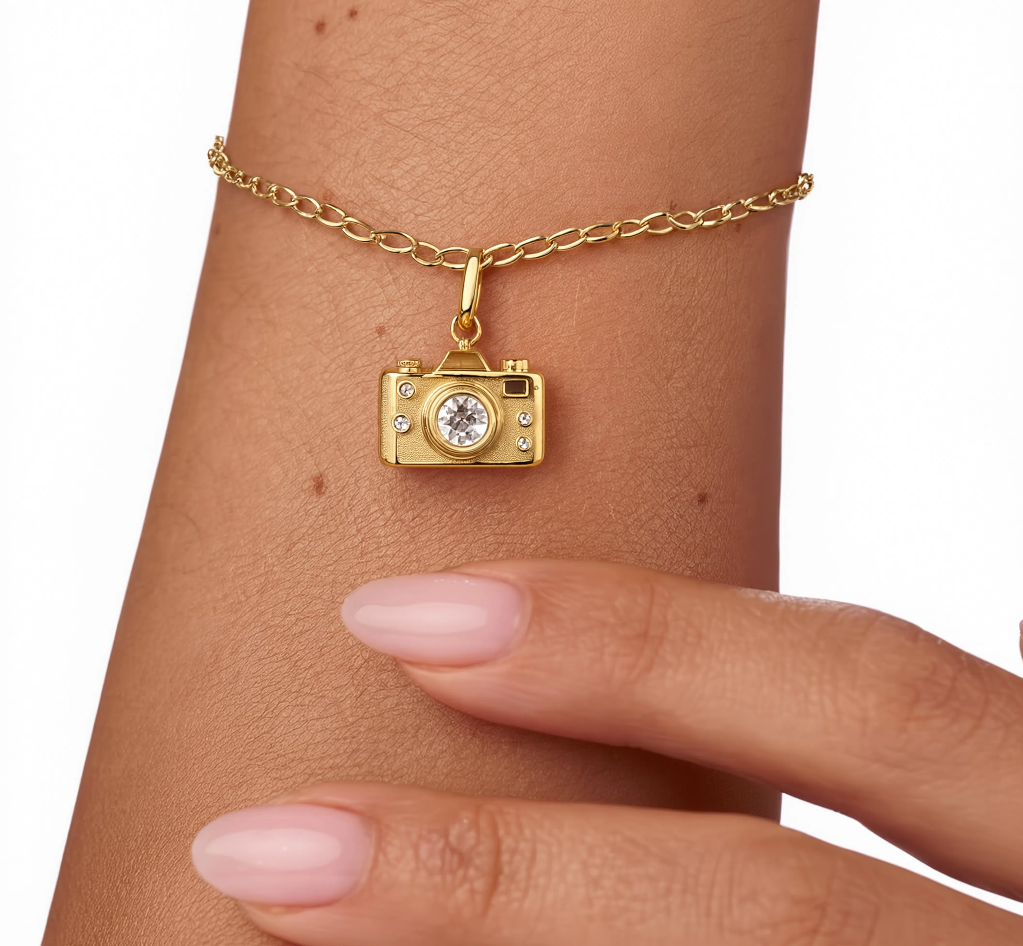 Camera Charm Gold — worn on bracelet