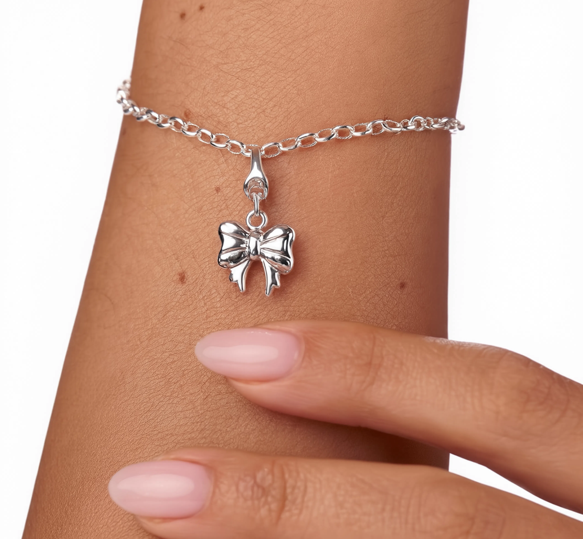 Bow Charm Silver — worn on bracelet