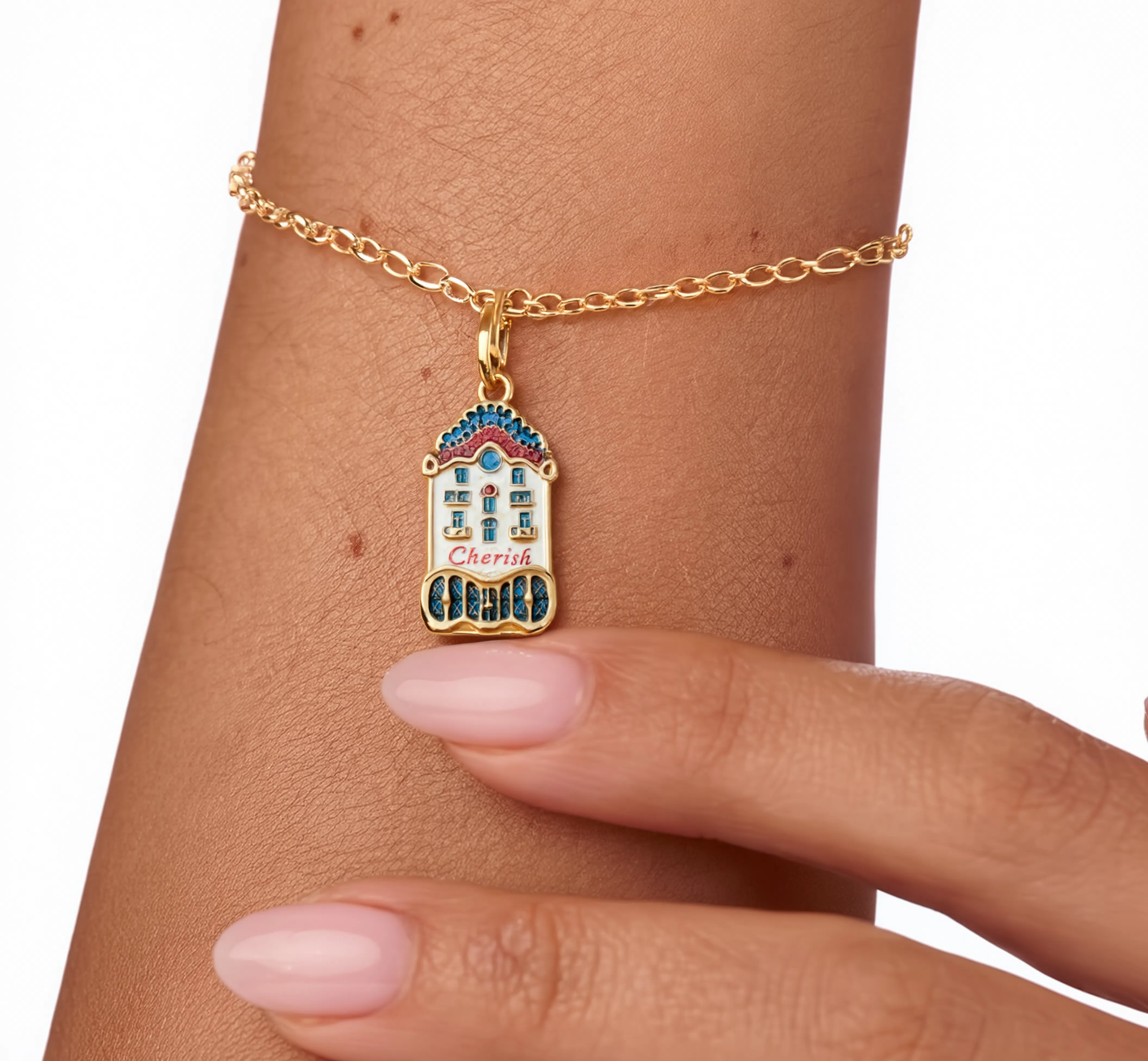Casa Batlló Charm Gold — worn on bracelet