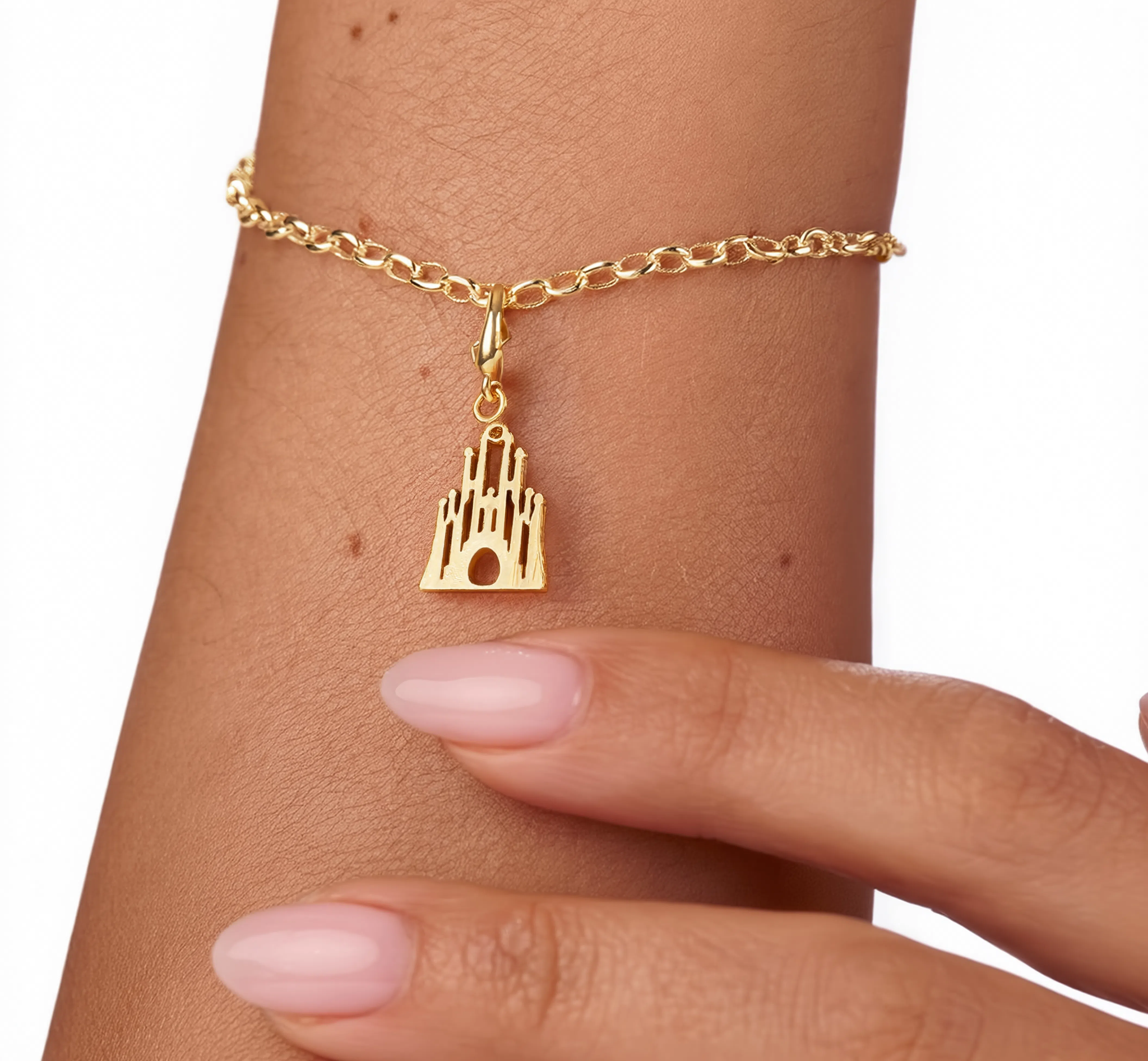 Sagrada Família Charm Gold — worn on bracelet