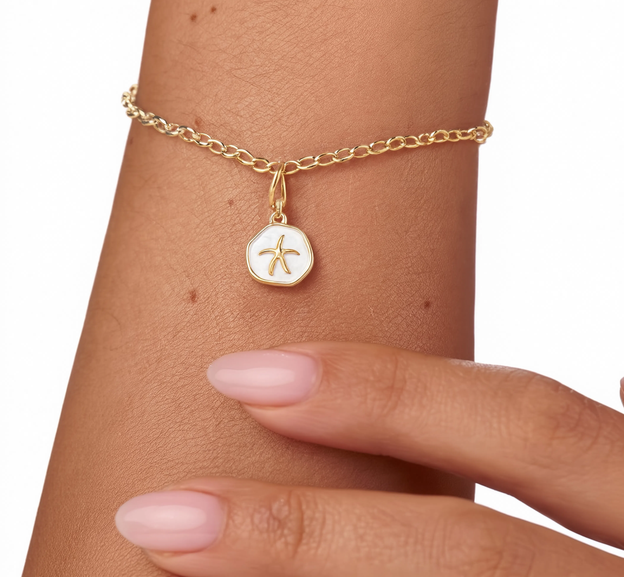 Starfish White Charm Gold — worn on bracelet